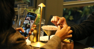 Couples enjoying a romantic dinner at Ayza Wine & Chocolate Bar, a cozy Midtown Manhattan restaurant perfect for anniversaries, date nights, and wine lovers.