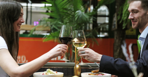 Elegant anniversary dinner setup at Ayza Wine & Chocolate Bar, a romantic restaurant in Midtown Manhattan known for fine wines, gourmet chocolates, and intimate ambiance.