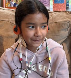 Photo of a child receiving vagus nerve stimulation therapy