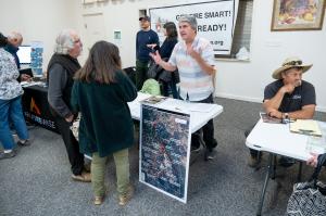 Residents sharing information about wildfire preparedness with one another in Napa County