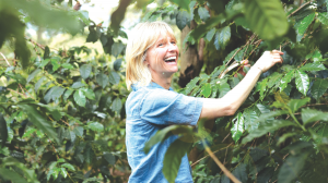 Portrait of Roxanne Joyal in a coffee field in Ecuador.