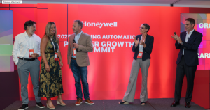 Caroline and Neil Fright (left) receive their Growth Award from Honeywell