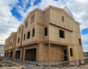 Bamboo panel framed three story townhome with five units. This three-story townhome built by Concord Homes Utah using BamCore's framing system reduces operating costs for occupants.