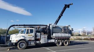 Sweet's Septic Tank & Backhoe Service Truck