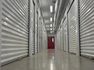 Interior view of a clean, well-lit climate-controlled self-storage unit at Citizen Storage Grand Blanc.