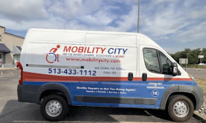 Photo of Mobility City Technicians arrive in branded vans equipped as a workshop on wheels for repairs and deliveries