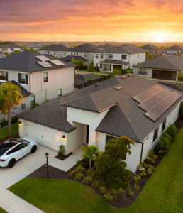 Clear-Title Solar Home™ featuring integrated solar panels on the roof of a modern Florida house
