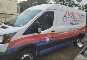 Photo of van:Mobility City repair technicians make house calls in a van equipped as a 'workshop on wheels'.