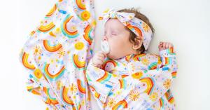 rainbow baby pajama, swaddle, and bow set