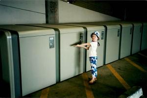 Hannah showing off the first iteration of doors for user-provided locks in 2001.