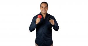 Man holding red and black biomagnetic therapy magnets