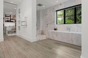 Each plank is a work of art—brushed, stained, and finished by hand to highlight the natural beauty of the wood grain.