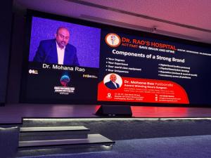 Dr. Mohana Rao Patibandla presenting on brand-building strategies at NSI PPF 2025, showcasing insights from the best spine surgeon and endovascular neurosurgeon in India.