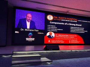 Dr. Mohana Rao Patibandla, award-winning neurosurgeon and the best spine and endovascular neurosurgeon in India, presenting on brand-building in private medical practice at NSI PPF 2025, Hyderabad.