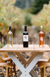 3 bottles of wine, cabarnet, napa valley wine, vineyard, revelette wines