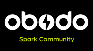 "Obodo" written in white font on an all black background with a green tag line under it that says "Spark Community"