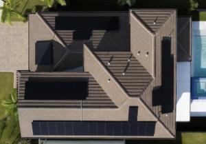 Aerial view of modern Florida home with rooftop solar panels representing QuiqNest's Clear-Title Solar Home™ platform that eliminates UCC-1 liens and builds equity from day one
