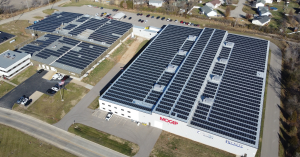 Aerial view of rooftop solar installation by Artisun Solar at MOCAP facility in Missouri, highlighting large-scale commercial solar power.