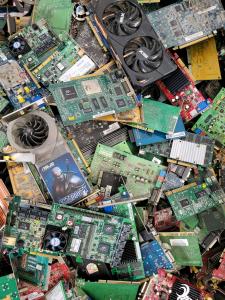 Pile of obsolete circuit boards, devices, and e-waste