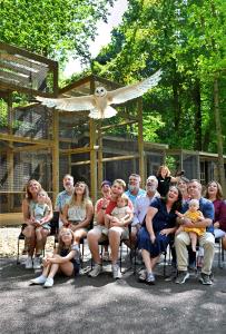 The appearance of a massive owl overhead educates Ohio Bird Sanctuary visitors on the importance of wildlife preservation.