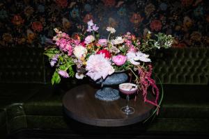 Rose of Sharon Floral Design's garden-style arrangement photographed at Lady Slipper, Bentonville for At Home in Arkansas magazine's Visionaries issue. Photo credit: @itsdaniellegreen for @layersphoto