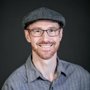 headshot photo of a good looking corporate professional