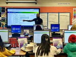 Money Path Delivery Specialist, Vincent Wallace-Haygood, delivers Money Path to students in a classroom