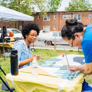 Nile Livingston, the visual artist behind the Unk P mural. Photo by @arekusn