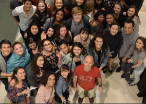 Seeger meets a group of students after a performance
