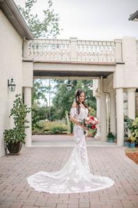 Chelsee Delgado—Miss Melbourne for America—is modeling a stunning gown by Aurora Bridal, with the beautiful Tuscan balcony of Bonita Ranch, a premier wedding venue in Melbourne, Florida