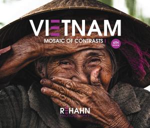 Cover of the photo book Vietnam, Mosaic of Contrasts I featuring the iconic portrait “Hidden Smile”, a Vietnamese elder woman by Réhahn