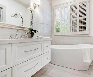 Completed bathroom remodel in Lake County, IL by Rohrer for Construction featuring quality tile, modern fixtures, and expert craftsmanship.