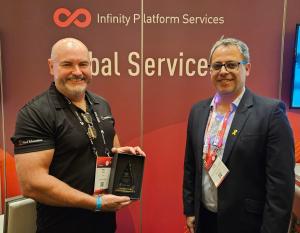 Mike Baird, CEO Red Education, receiving the Platinum Elite ATC Partner of the Year award from Shay Solomon, Director, Global Business Development and Cybersecurity Education at Check Point Software Technologies