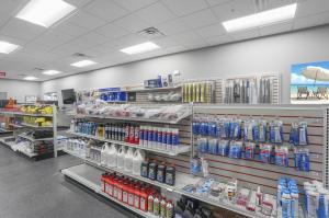 Peterbilt dealership parts showroom with shelves of semi-truck parts.