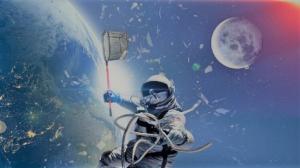 Artist drawing of  an astronaut riding a satellite in space with a net catching space debris.