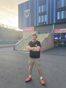 Football Fan, Xavier Wiggins in front of AFC Wimbledon, Stadium