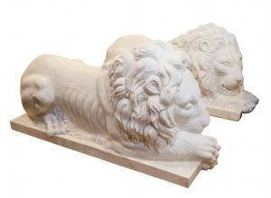 This large pair of marble recumbent lions, the opposing forms with paws crossed lying on a stone shelf and impressive at 34 inches tall by 22 inches long, should reach $6,000-$12,000.