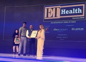 Dr. Mohana Rao Patibandla being felicitated on stage with the Economic Times Health Award 2025 for excellence in neurosurgery during the ET Health Conclave in Gurgaon.
