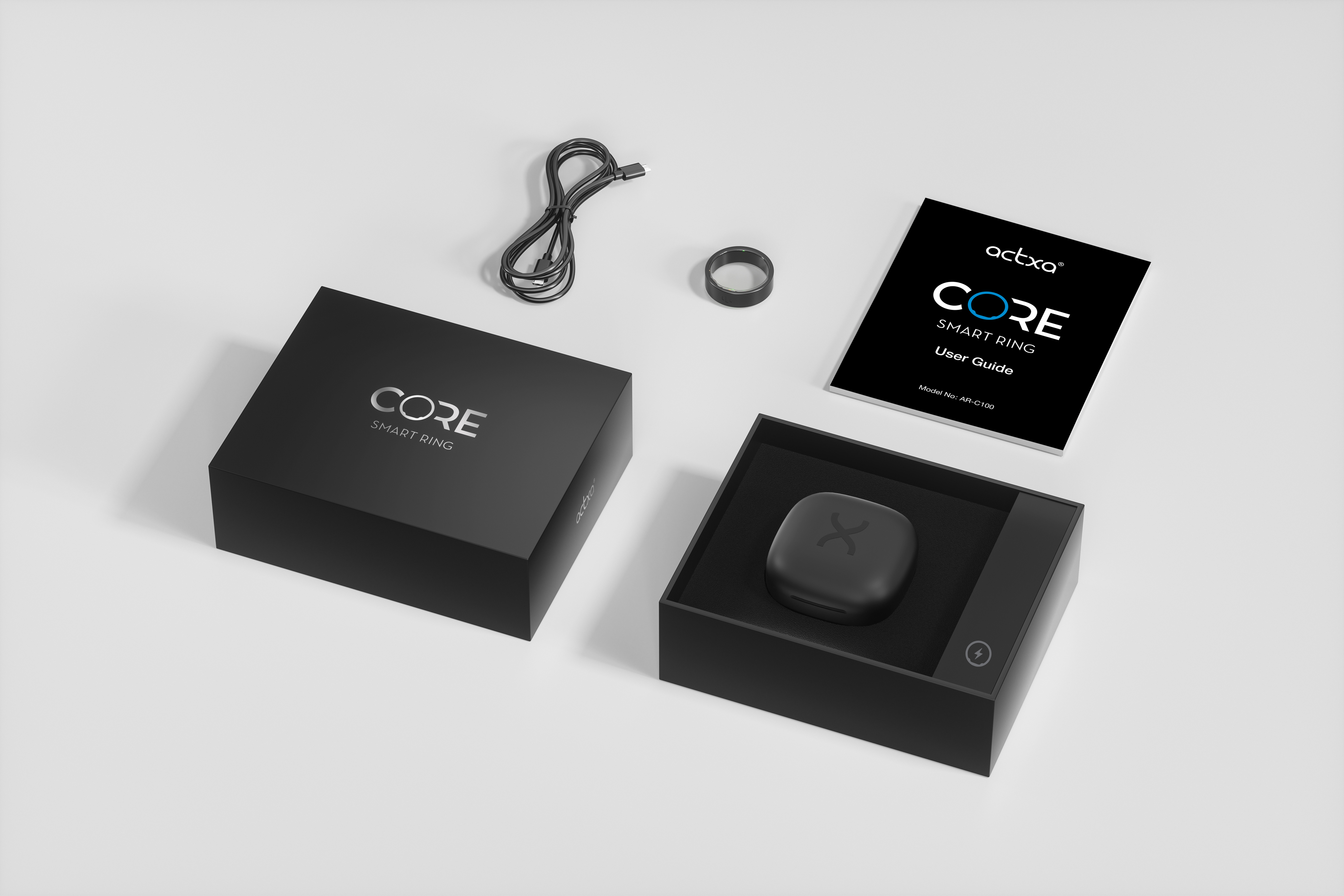 The Actxa Core Smart Ring, its packaging box, user manual, charging cable