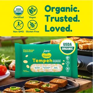 Royal Tempeh USDA Organic fermented soybean tempeh on an outdoor grill with “Organic. Trusted. Loved.” text, featuring vegan, non-GMO, and gluten-free certifications.