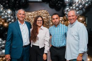 Mark Sims, Alejandra Piazza, Carlos Rivera, and Mark Jacobs (left to right) at the Puerto Rico office grand opening celebration.