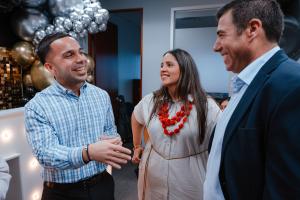 7587 – Carlos Rivera, Awildalys Otero, and Humberto Torres (left to right) enjoying the celebration at Madison Insurance Group’s new office grand opening in Puerto Rico.