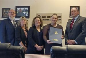 State Rep. Rebecca Martinez, The Drive On Foundation VP Melissa Sirois, Foundation volunteers Steve and Tammy Small, and Treasurer Edward Ramsdell attended a ceremony honoring the legacy and memory of CSM Gary F. Sirois.