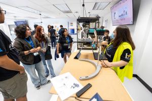 Students from community colleges are taking a tour through Cal State LA lab.