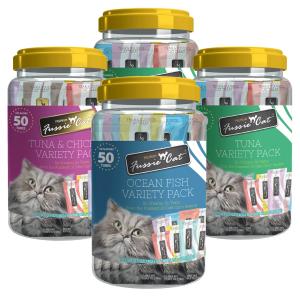 Four Fussie Cat Variety Pack tubs, including Tuna, Tuna & Chicken, and Ocean Fish flavor assortments.