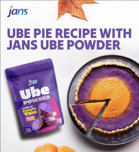 A baked ube pie with bright purple and orange layers next to a Jans Ube Powder bag, highlighting its use in desserts.