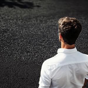 Professional asphalt sealcoating service in Auburn, AL applying a protective coating to extend pavement life and enhance appearance.