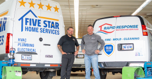 Five Star Home Services CEO, Christian Rattin, (left) and Rapid Response Restoration Services Founder, Dale See, (right) standing between Five Star Home Services and Rapid Response Restoration Services vans inside a garage, representing their new partnership.