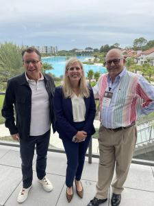 George Wilbanks at IPA Vision 2024 with IPA CEO Anya Coverman and Chip Roame of Tiburon