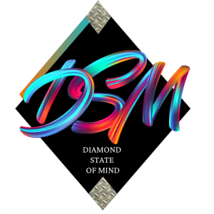 Logo image in the shape of a diamond with the company name "diamond state of mind" in the center of the logo. The four points of the diamond represent activism, arts advocacy, akitas, and agricultural sustainability.